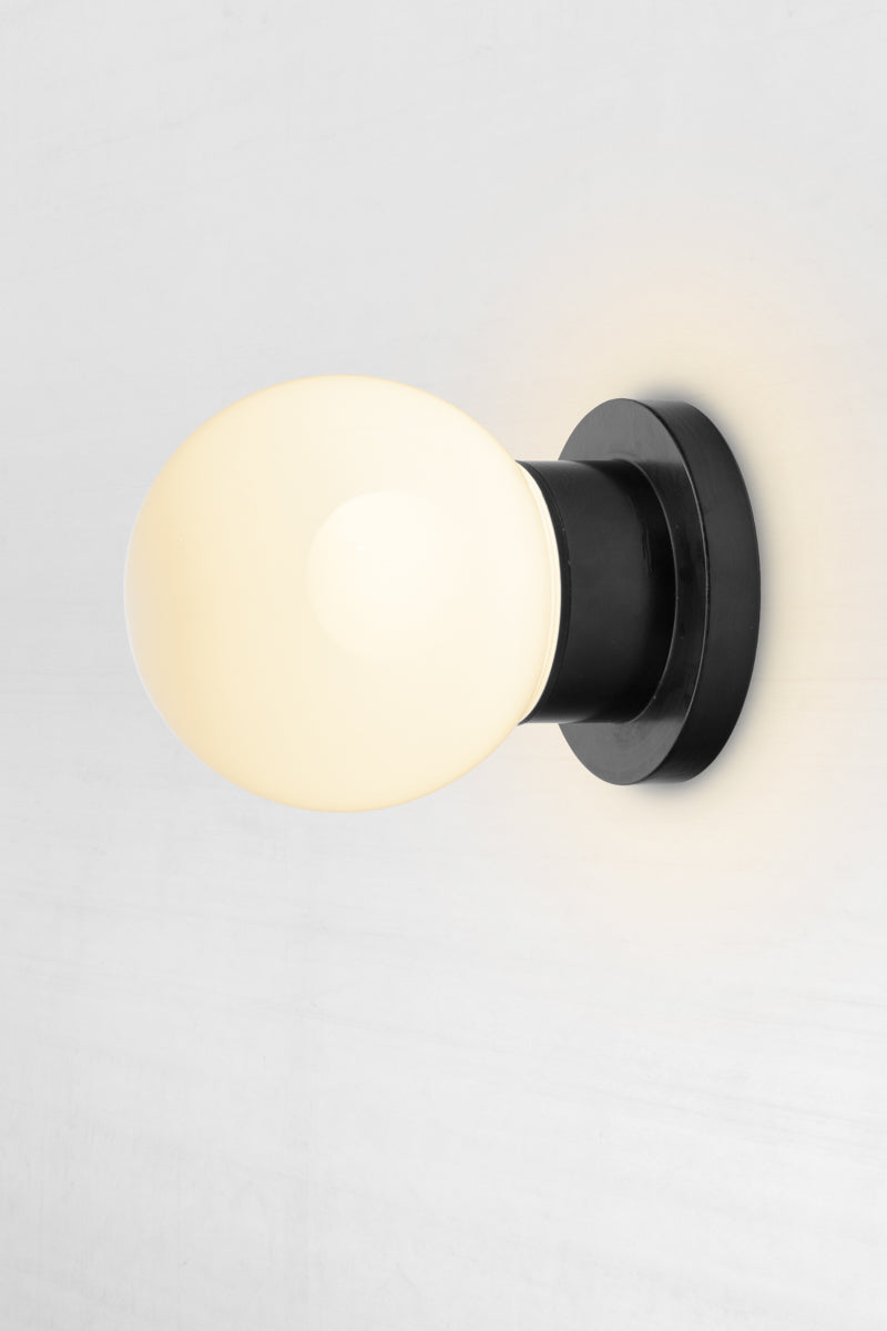 Bunker globe wall light with opal glass ball cover