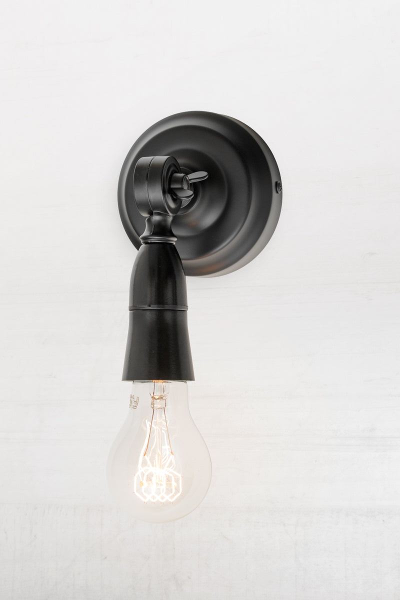 Black batten holder with adjustable lampholder. 