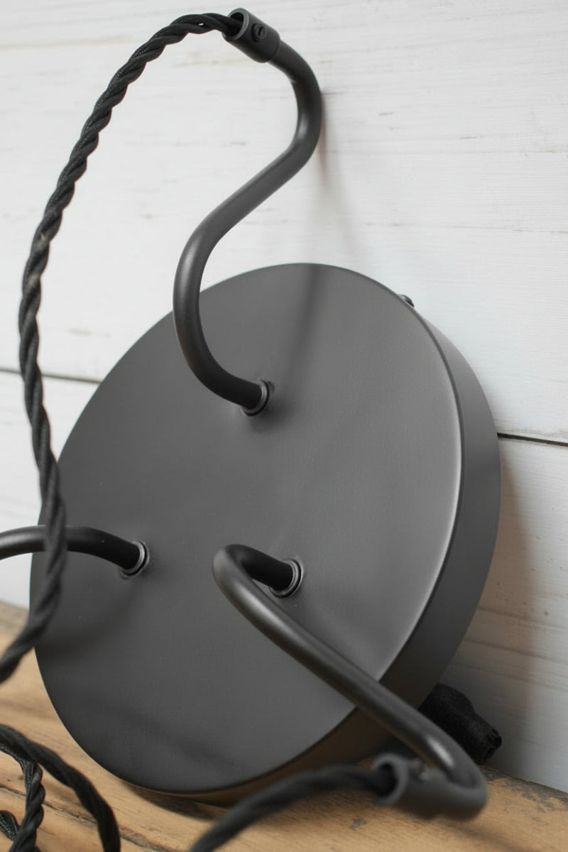 Matt black ceiling rose with gooseneck arms. 