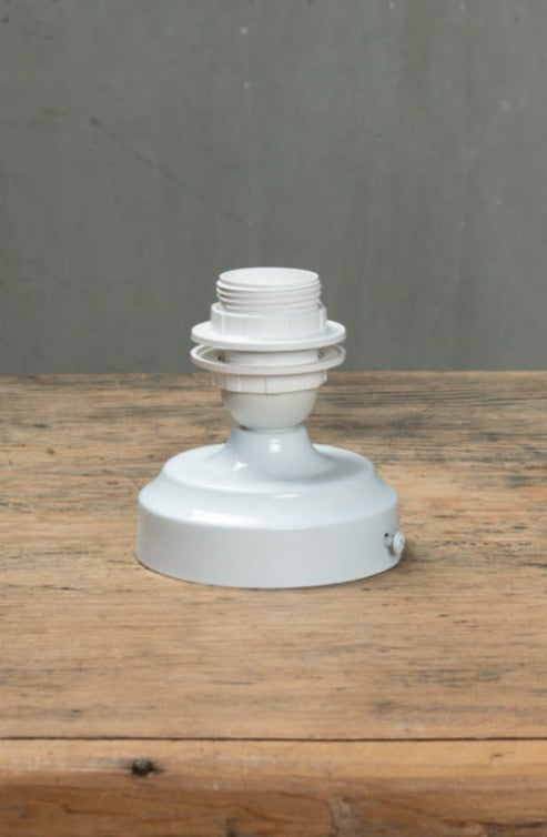 Gloss white batten holder with a curve.