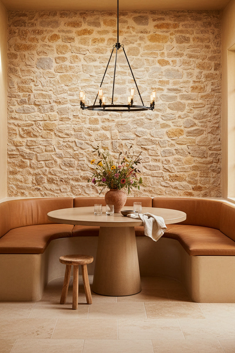 8 light circular chandelier with teardrop bulbs in a rustic modern dining space. 