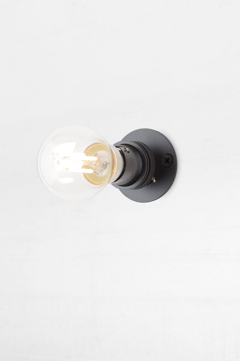 black batten holder allows shades to be fitted to wall in the closest possible position.