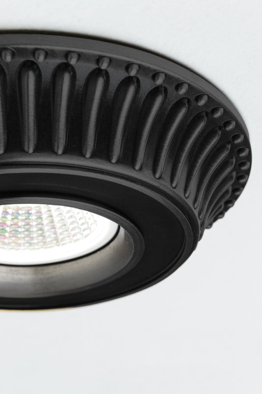 black finish on brass recessed ceiling light with fluted detailing 