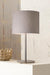 Linseed table lamp above a coffee table