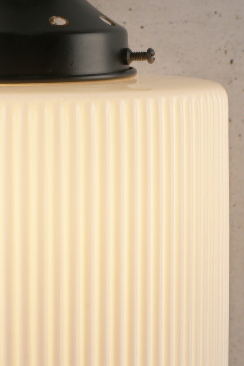 Showing the deailing opf the opal glass shade and its reeded detailing