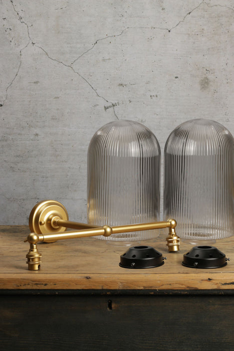 Lloyd Reeded clear Glass with gold brass Double Swivel Arm Wall Light