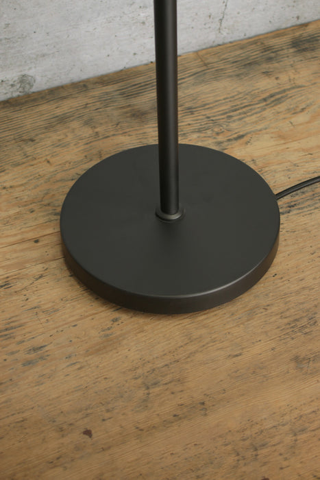 black base of the floor lamp