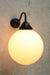 large size glass ball on steel sconce