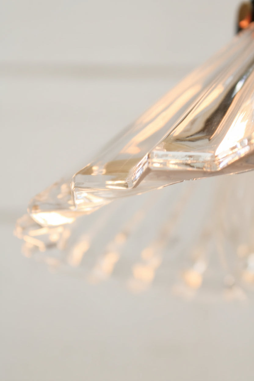 Close up of the detailing on the clear glass shade