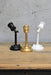 Black, white and gold/brass finish wall lights