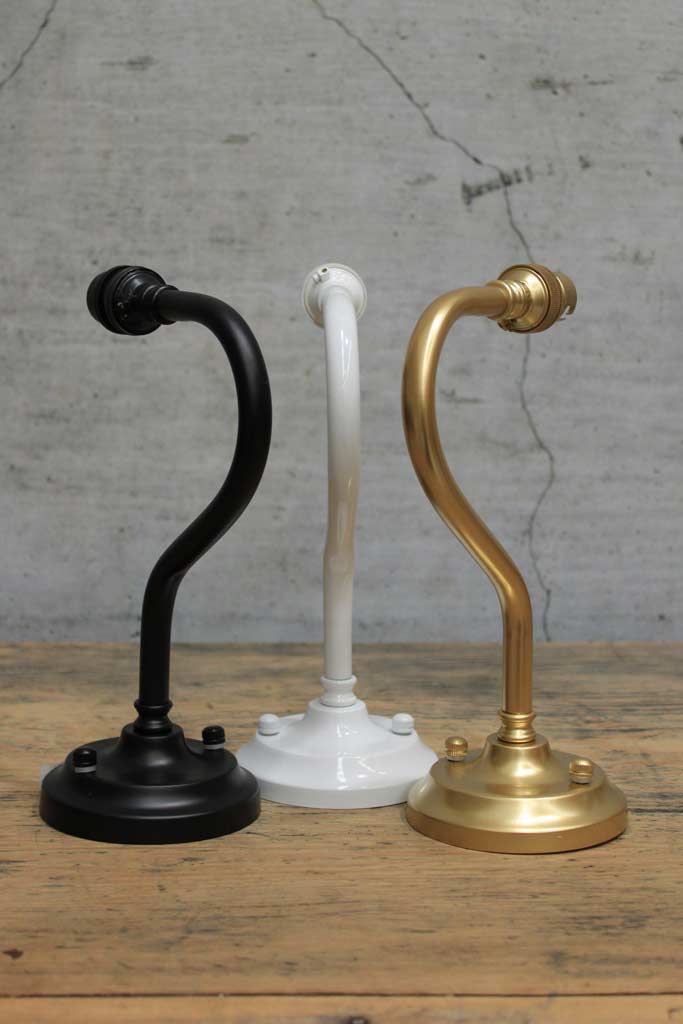 Gooseneck wall sconces in the finishes