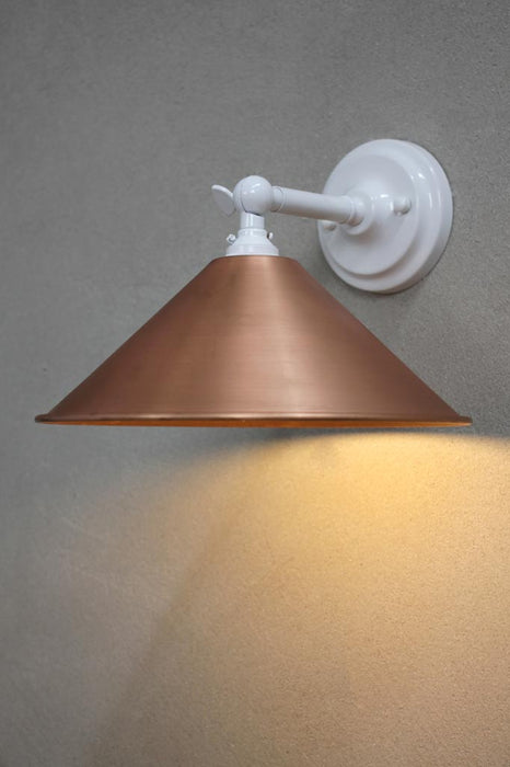 Small copper cone wall light with white arm