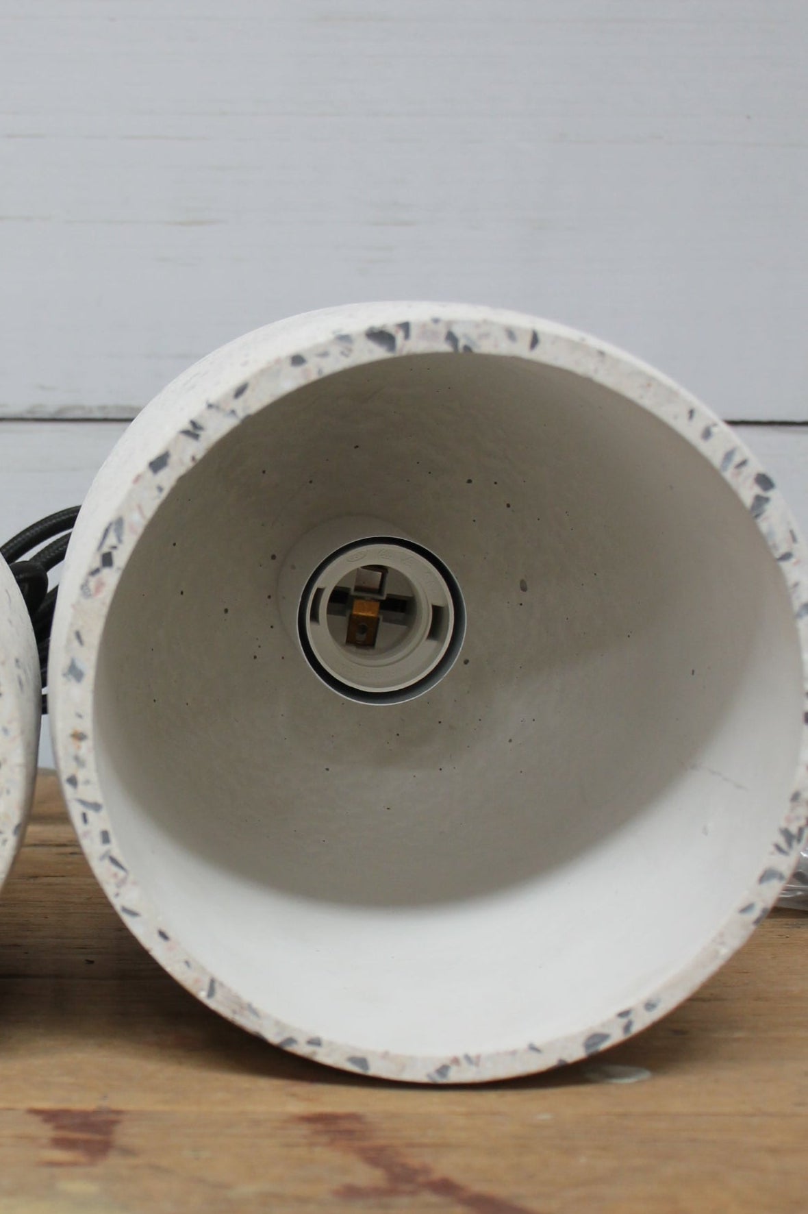 Concrete terrazzo pendant light inner showcasing lampholder