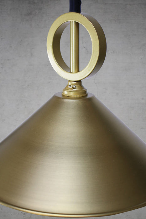 Bright brass cone pendant light with gold brass metalware