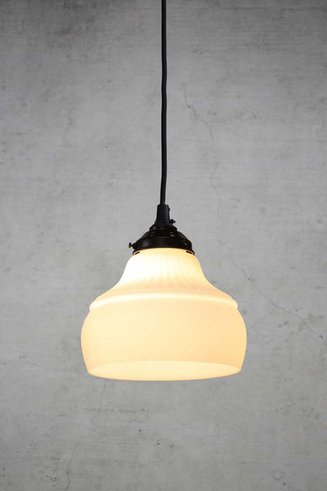 Opal glass pendant light with round black cord
