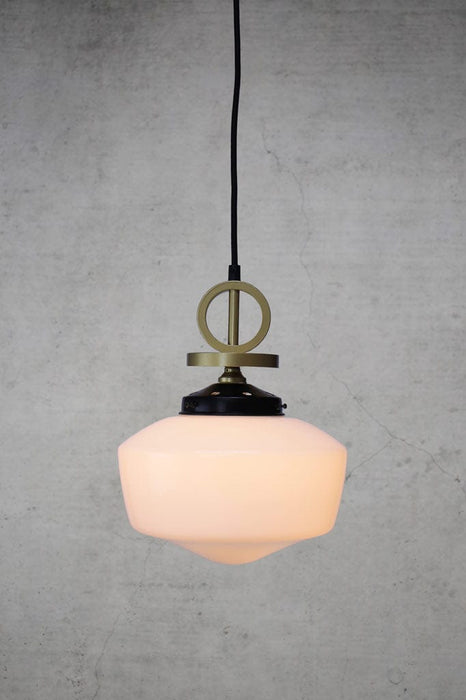 Medium opal glass pendant light with gold brass disc cord with black gallery