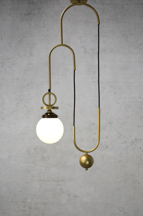 Opal pendant light with gold brass pully cord with disc