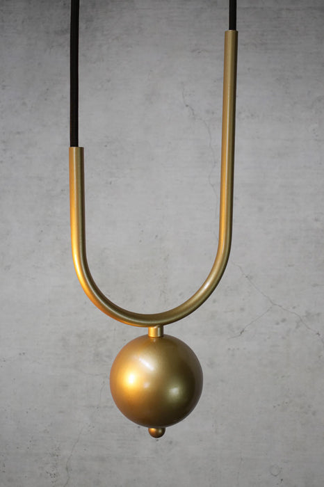 Weighted-sphere-in-gold