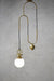 Opal pendant light with gold brass pulley cord and disc with matching gallery