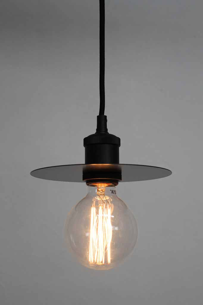 Black disc and black prndant cord with clear bulb. 