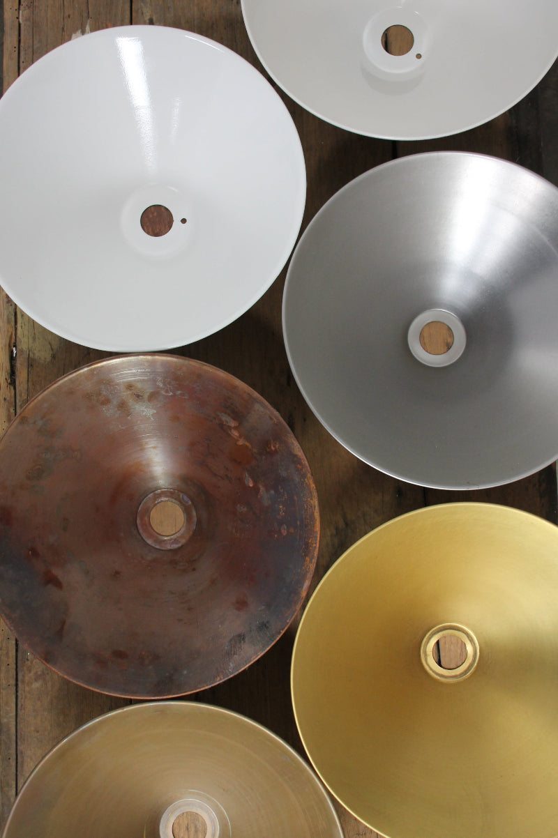 Uner side view of the metal cone shades in 6 finishes. 