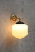 Deco Glass Wall Light steel gold/ brass arm with black gallery and opal shade