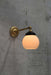 Michigan wall light in gold/brass steel finish with small shade