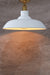 gold batten holder with a white bullpit flush mount light