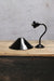 small black shade with black brass finish on wall sconce
