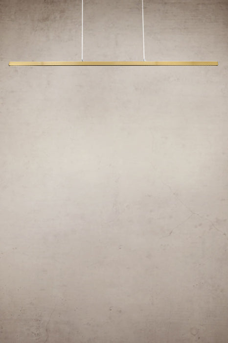Gold/brass linear pendant light with stainless steel cables
