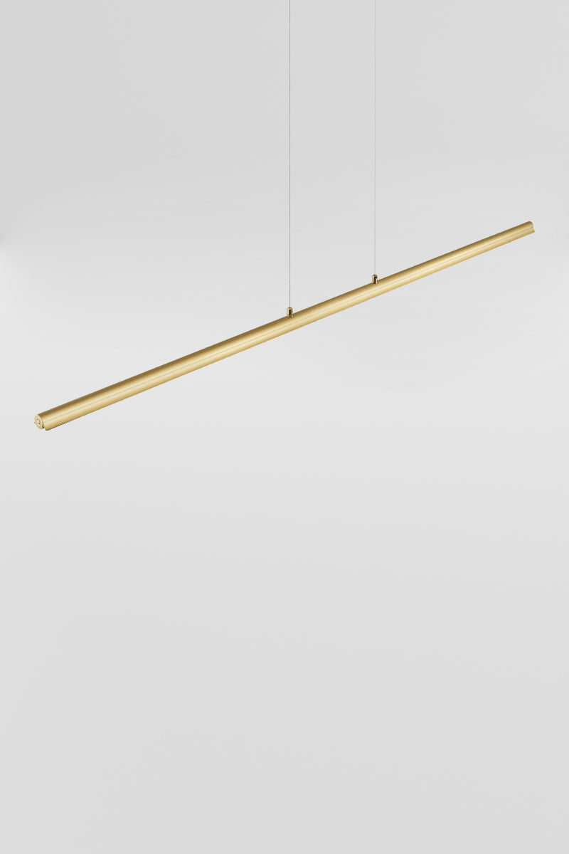 Linear LED pendant light shade in brass finish. 