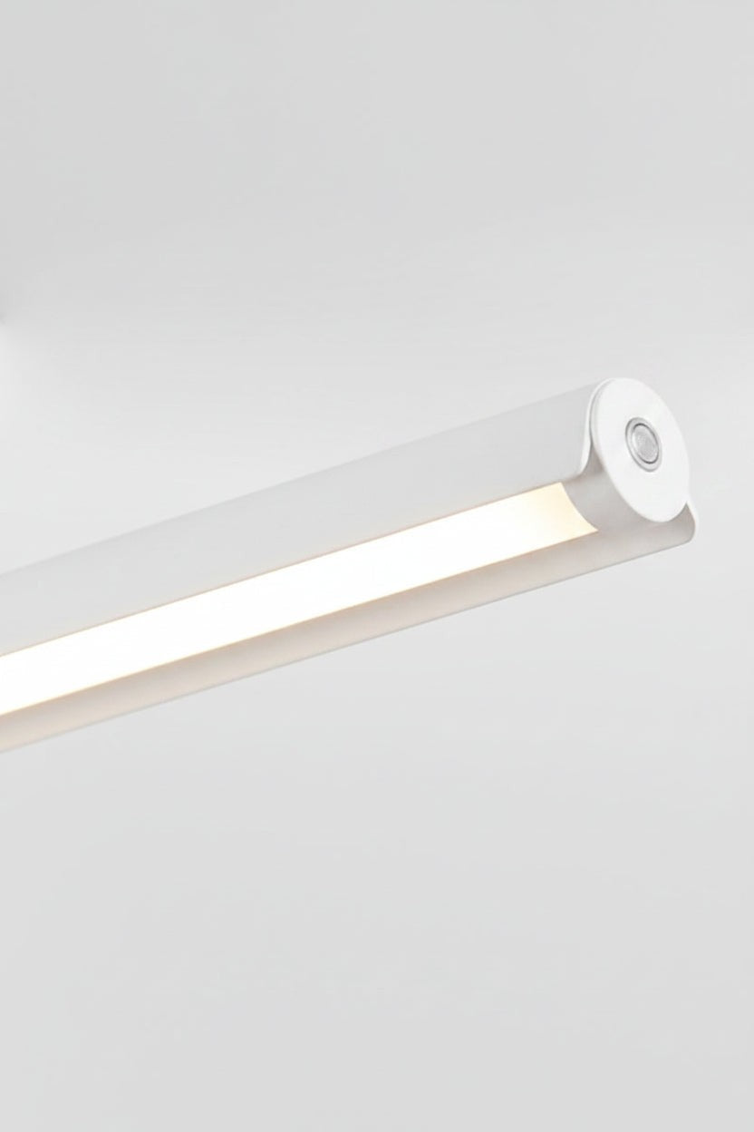 Linear LED pendant light in white close up.