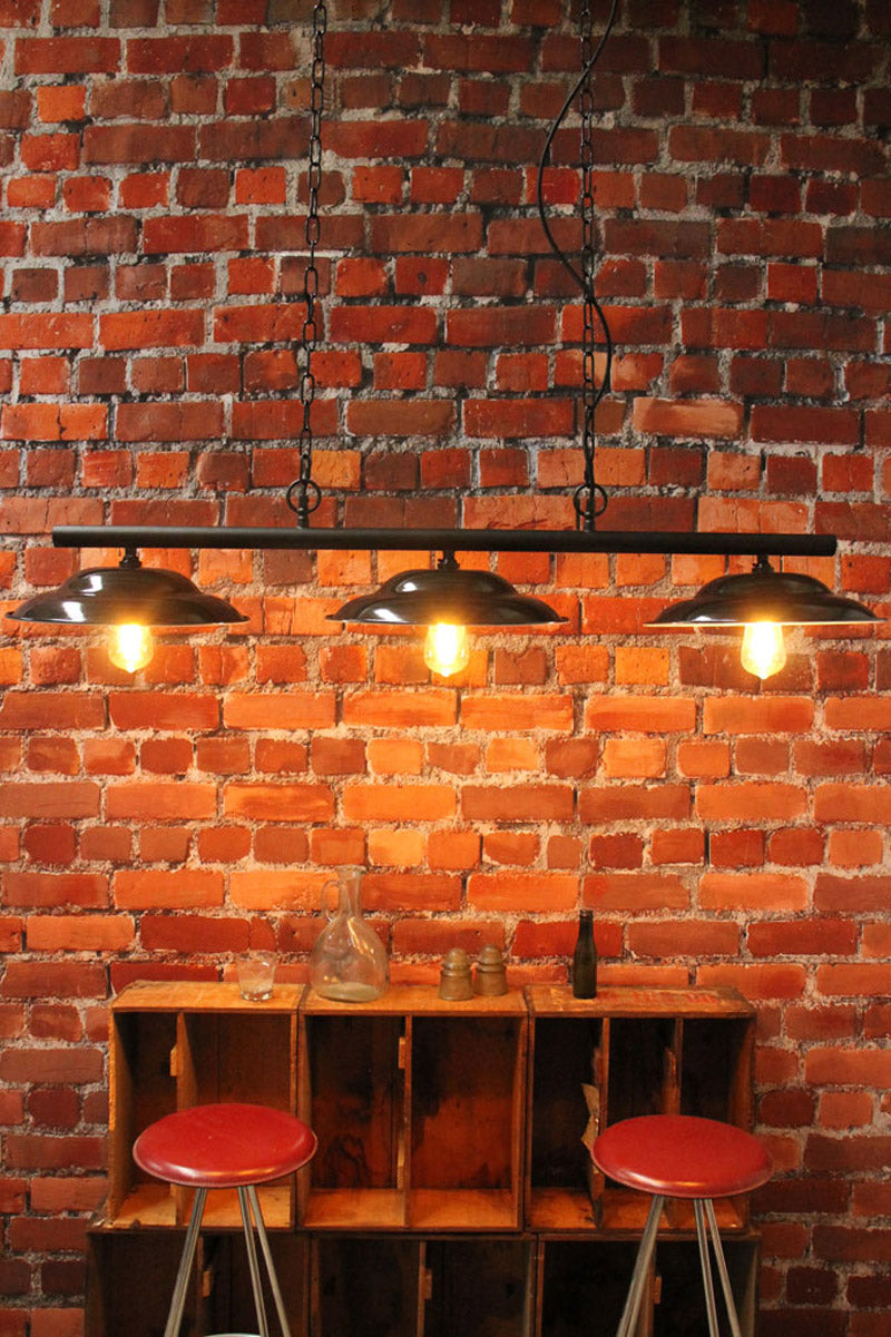 Multi light pendant. industrial style lighting. vintage enamel shades