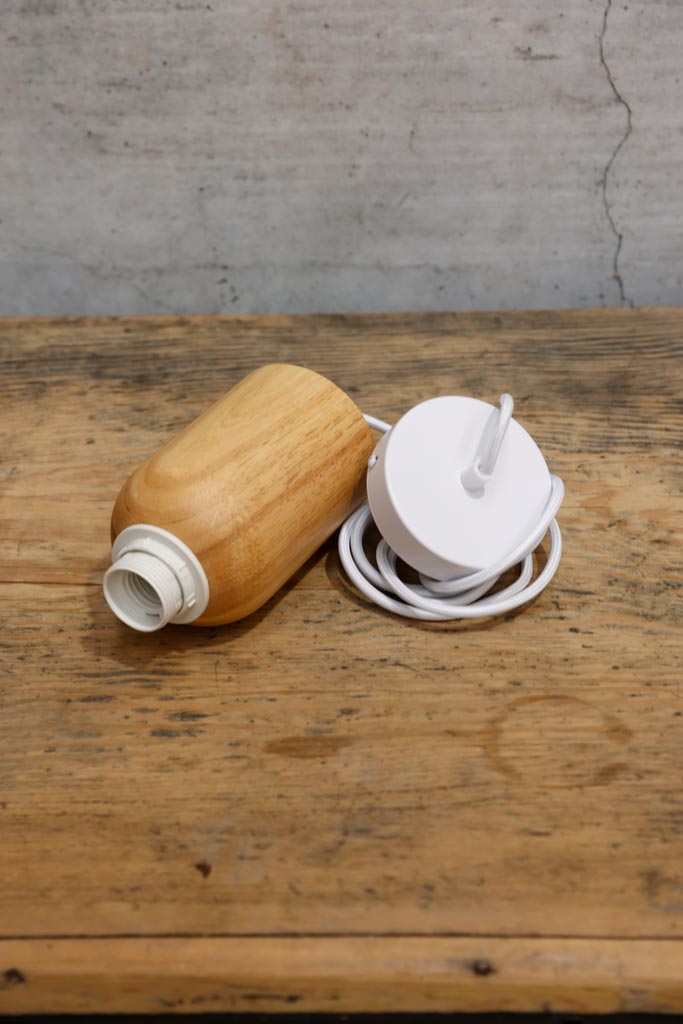 Nord pendant cord is made out of natural wood, timber.