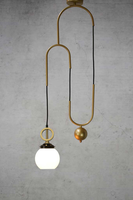 Open glass pulley pendant with gold cord