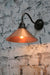 Outdoor-wall-light-with-bright-copper-shade-and-bronze-arm