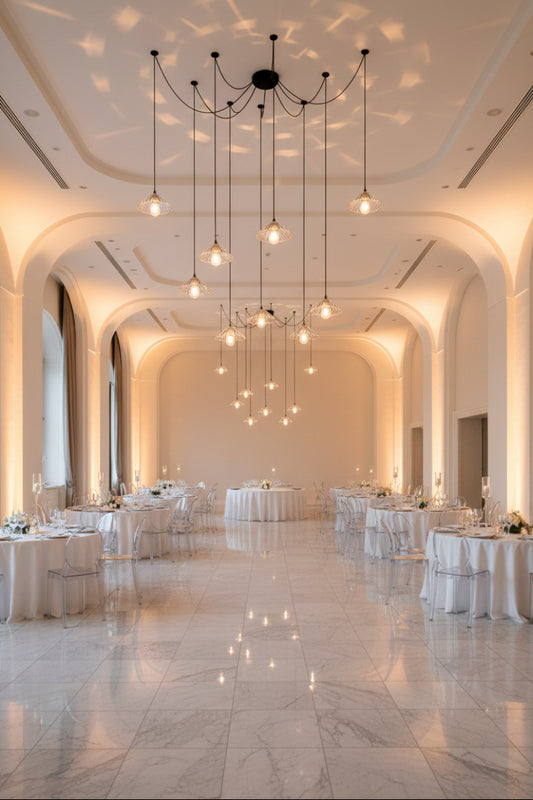 9 drop chandelier with cord mounting plates and clear glass pleated shades. in event space