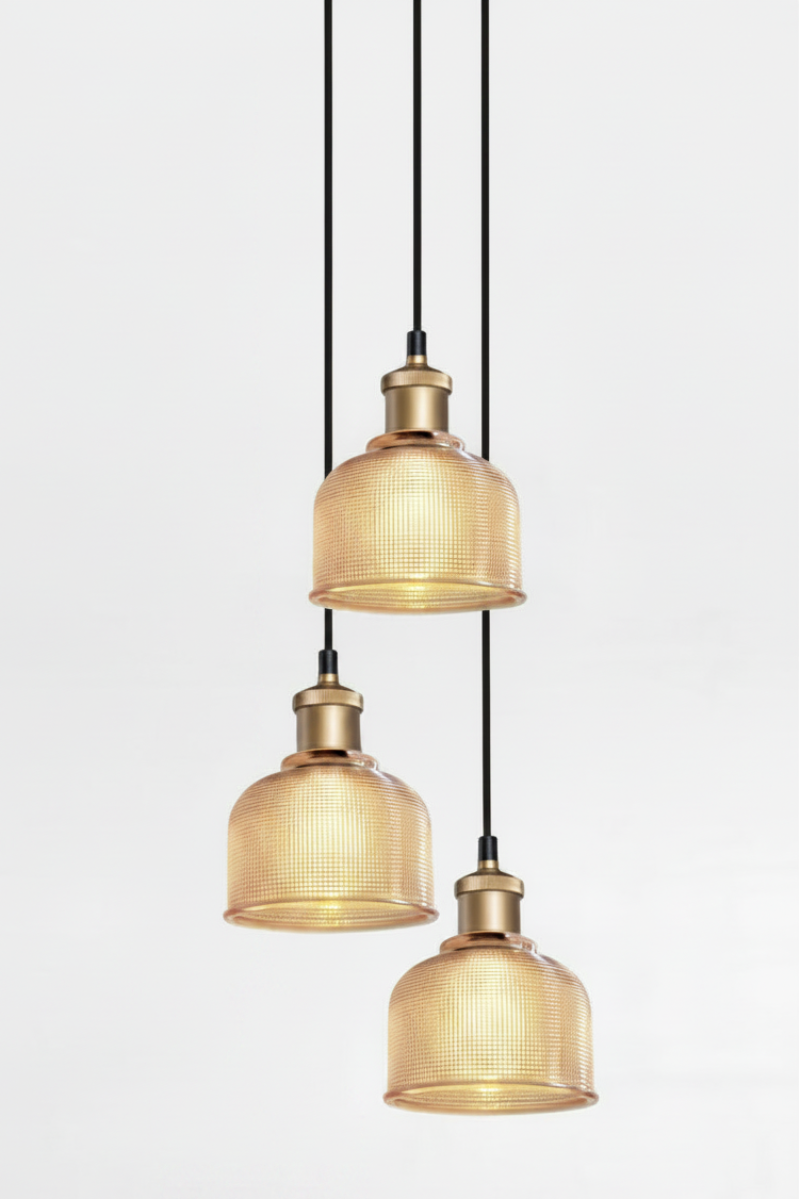 set of 3 amber shades on a 3 drop with gold brass fittings