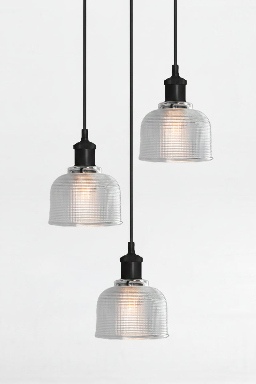 3 light multi pendant with black ceiling rose, black pendant cords and crosshatch glass clear shades. 