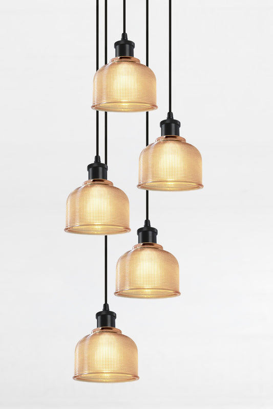 5 light multi pendant with black ceiling rose, black pendant cords and crosshatch glass amber shades. 