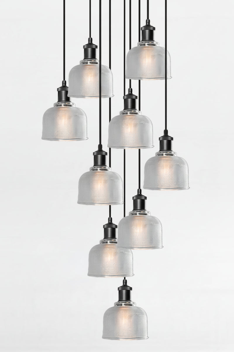 9 light multi pendant with black ceiling rose, black pendant cords and crosshatch glass blue shades. 