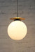 Opal large pendant light with brass disc