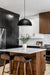 steel black shade with cable cord pendant. over kitchen counter