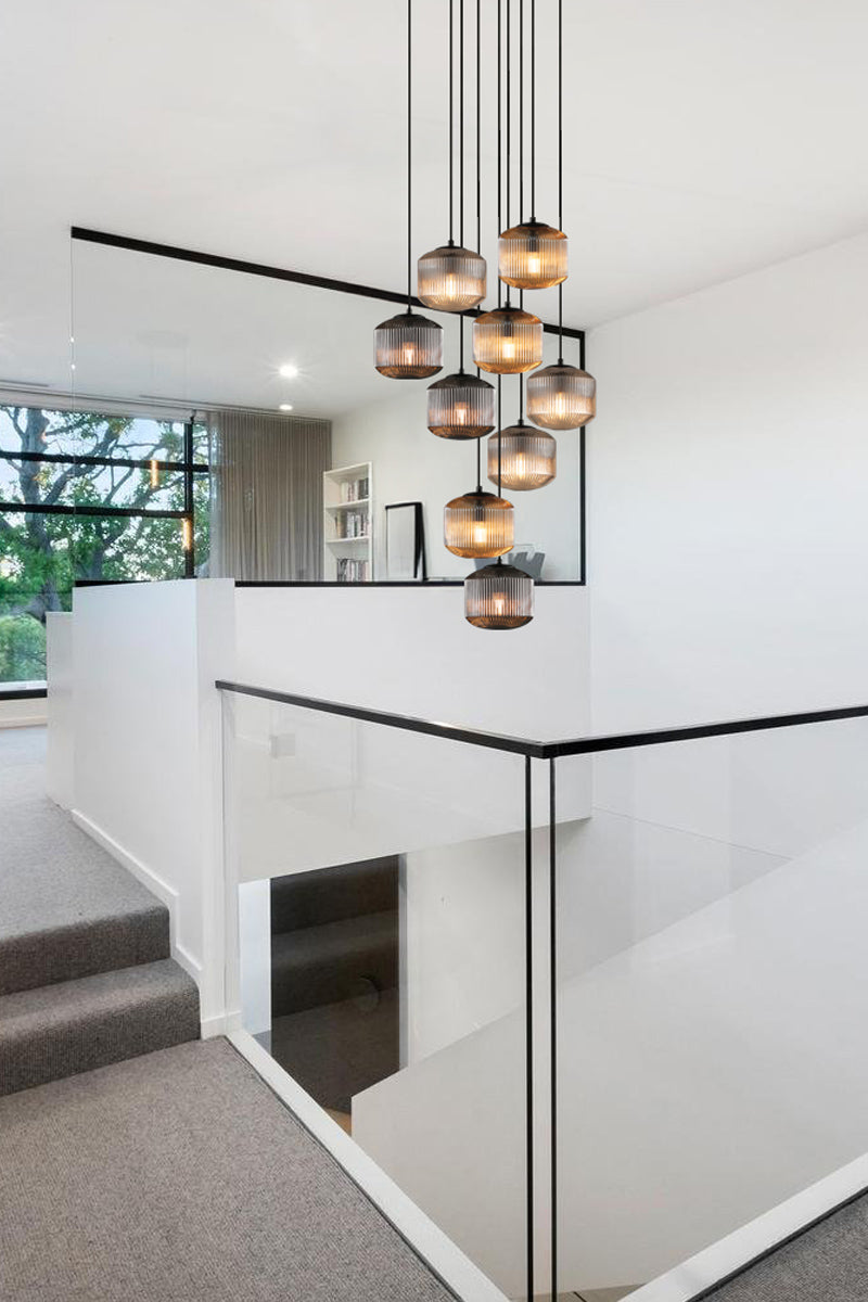 9 light chandelier with amber, grey and clear reeded glass shades. 