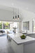 3 haning glass dome pendant lights in kitchen