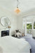 Schoolhouse Pendant Light - Portland with black chain cord in a bedroom 
