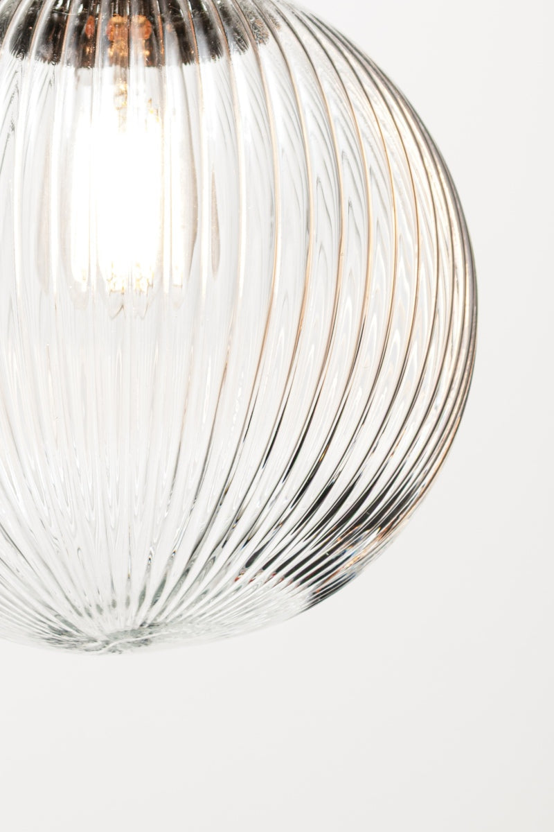 Close up of the medium clear reeded glass ball shade. 