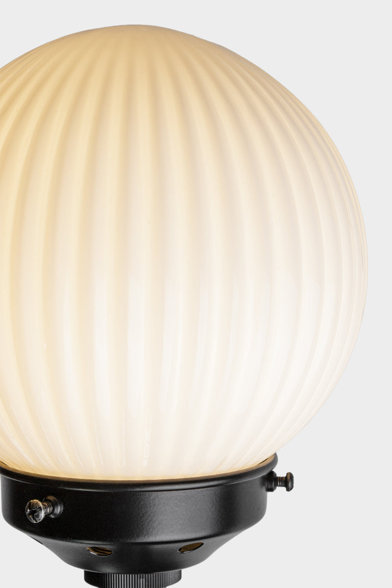 opal glass with reeded detailing on a double sconce wall light