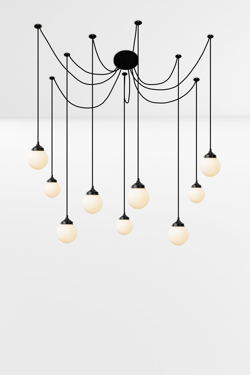9 drop chandelier with mounting plates and opal reeded glass shades.