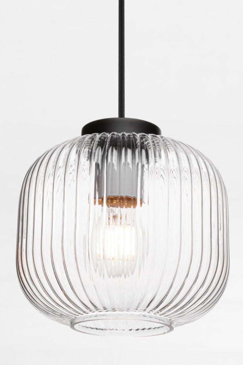 clear reeded glass shades and black cord. 